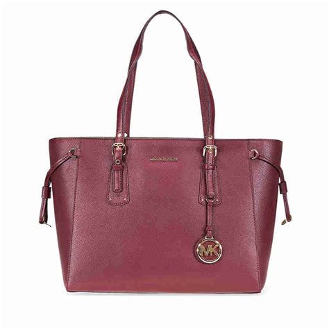 macy michael kors purses voyager medium oxblood|Michael Kors crossgrain tote bag.